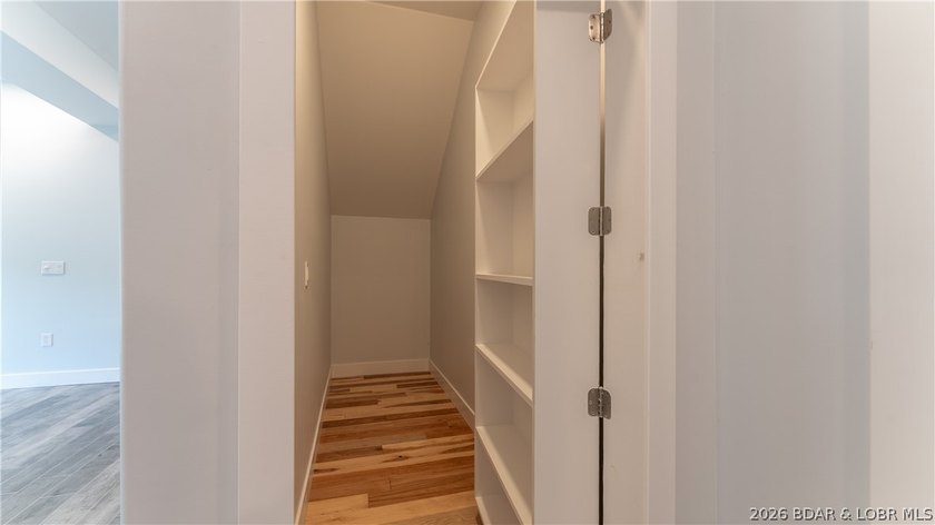 Experience Open Space Luxury lakefront living in this custom - photo 32