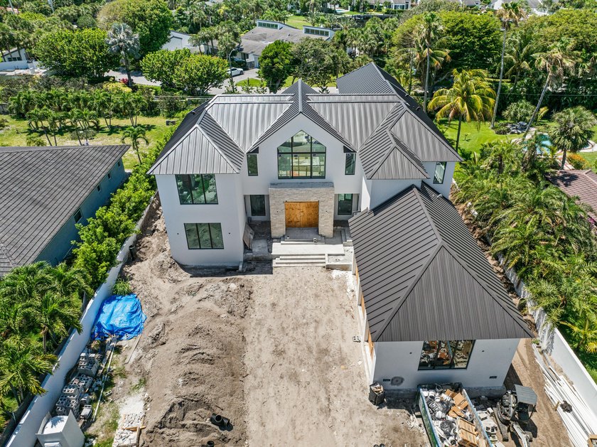 Discover the Pinnacle of Coastal Luxury with this Brand-New Home - photo 33