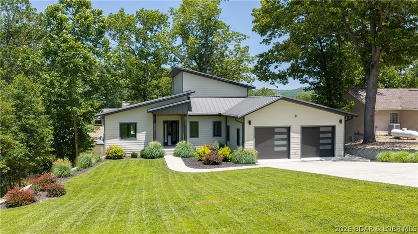 Experience Open Space Luxury lakefront living in this custom - photo 40