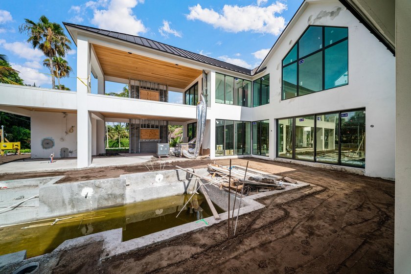 Discover the Pinnacle of Coastal Luxury with this Brand-New Home - photo 45