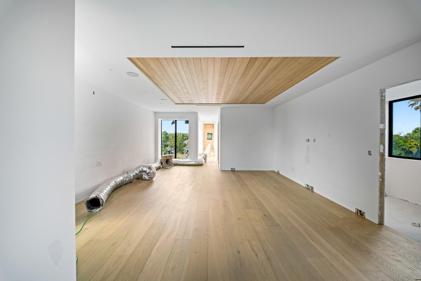 Discover the Pinnacle of Coastal Luxury with this Brand-New Home - photo 48