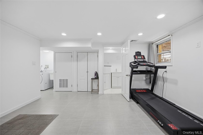 Sun filled, fully brick above ground 3 story townhouse with open - photo 15
