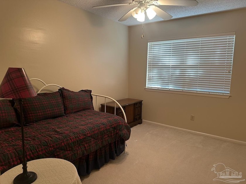 This spacious 4-bedroom, 2 bath home offers a functional layout - photo 2