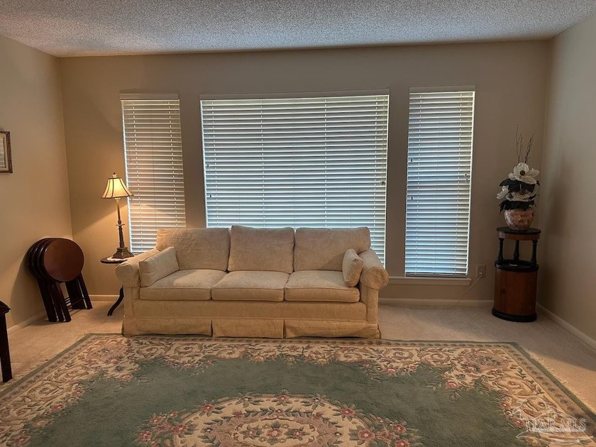 This spacious 4-bedroom, 2 bath home offers a functional layout - photo 3