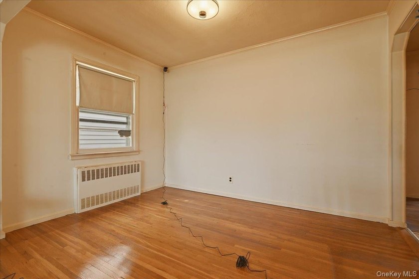 Cape Cod style detached home with 3/4 bedrooms and 1 full bath - photo 11