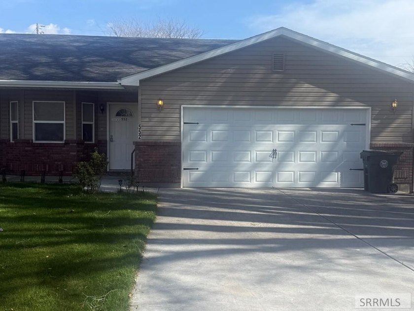 This charming 3-bedroom, 2-bathroom twin home is located in the - photo 3