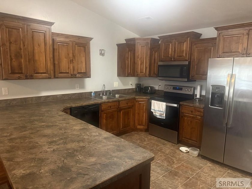 This charming 3-bedroom, 2-bathroom twin home is located in the - photo 8