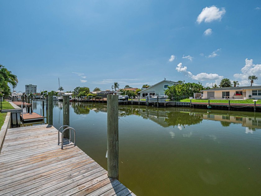 Welcome to this waterfront single-story residence in Coral Cove - photo 13