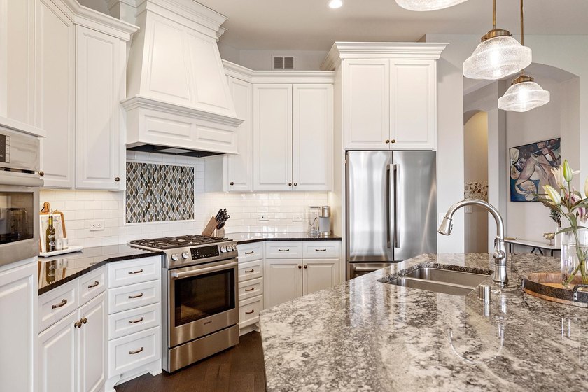 Experience the pinnacle of maintenance-free luxury living in - photo 16