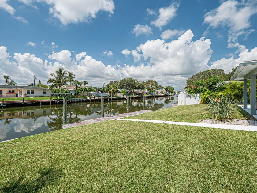 Welcome to this waterfront single-story residence in Coral Cove - photo 19