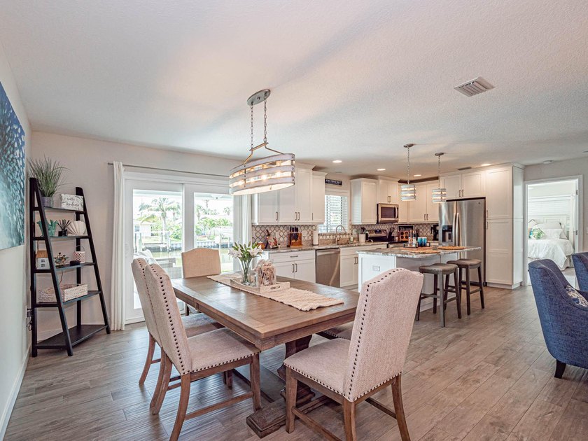 Welcome to this waterfront single-story residence in Coral Cove - photo 21