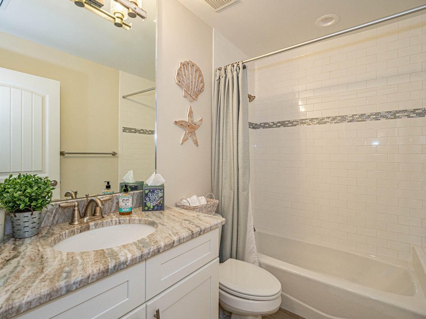 Welcome to this waterfront single-story residence in Coral Cove - photo 27