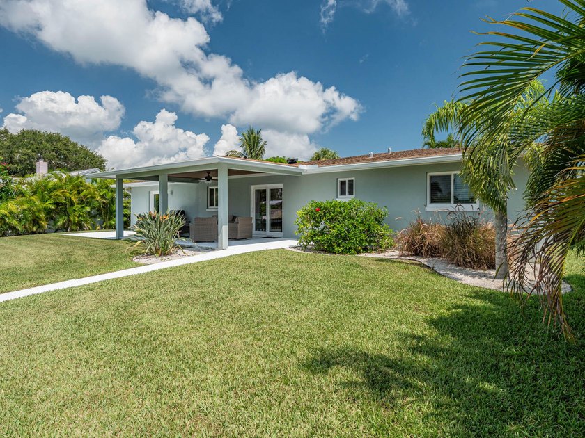 Welcome to this waterfront single-story residence in Coral Cove - photo 38