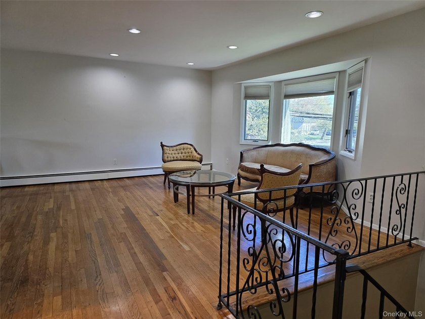 Spacious hi ranch with 4 bedrooms and 3 full bathrooms, set on - photo 3