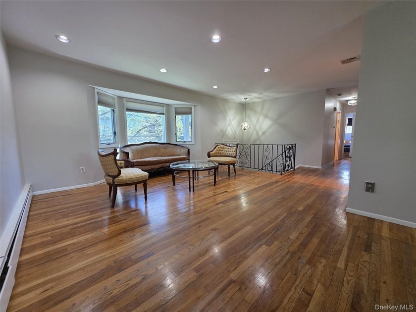 Spacious hi ranch with 4 bedrooms and 3 full bathrooms, set on - photo 4