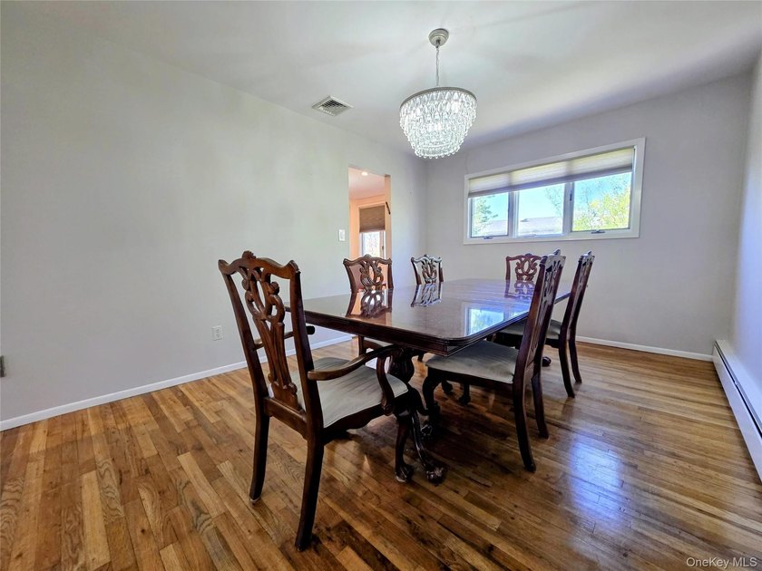 Spacious hi ranch with 4 bedrooms and 3 full bathrooms, set on - photo 5