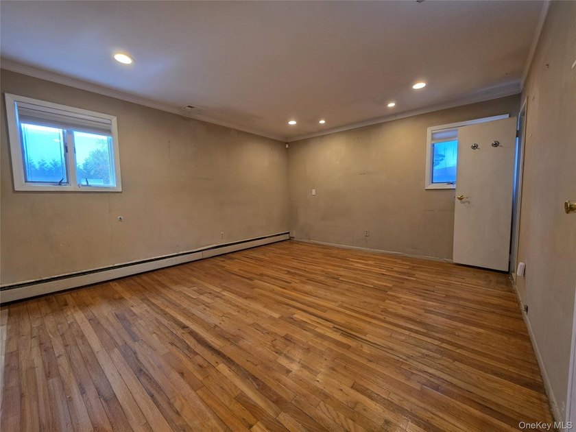 Spacious hi ranch with 4 bedrooms and 3 full bathrooms, set on - photo 8