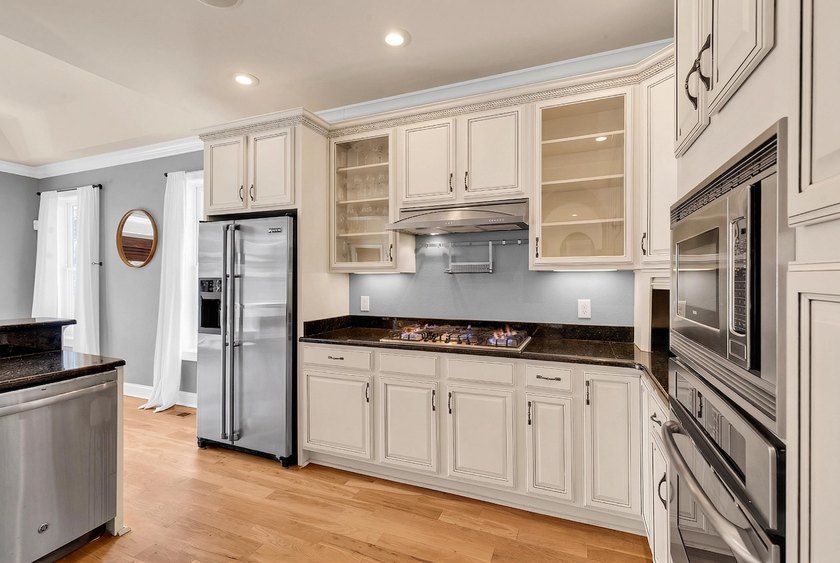 BEAUTIFUL CUSTOM 4-bedroom, 3.5-bath home brings together - photo 12