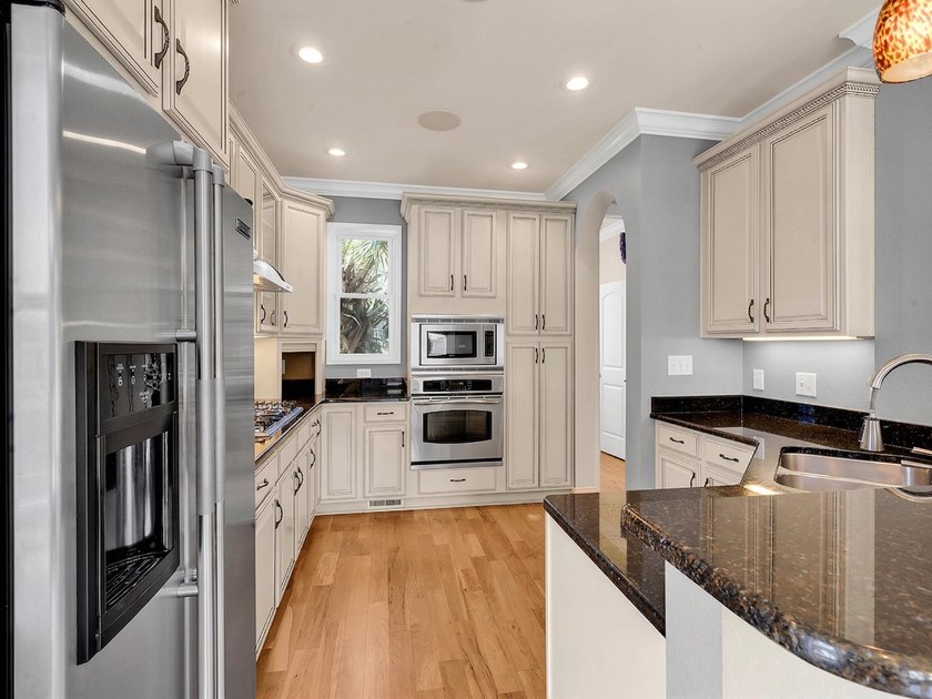 BEAUTIFUL CUSTOM 4-bedroom, 3.5-bath home brings together - photo 14