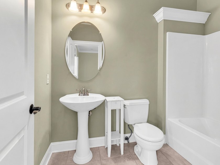 BEAUTIFUL CUSTOM 4-bedroom, 3.5-bath home brings together - photo 31