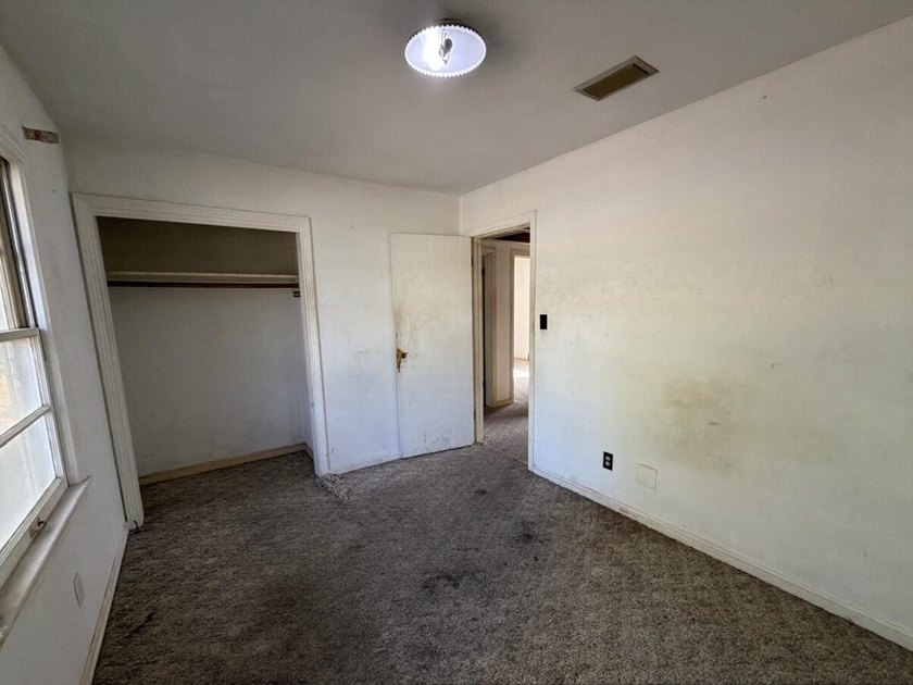 Located just a few miles from the bustling down town area and - photo 17