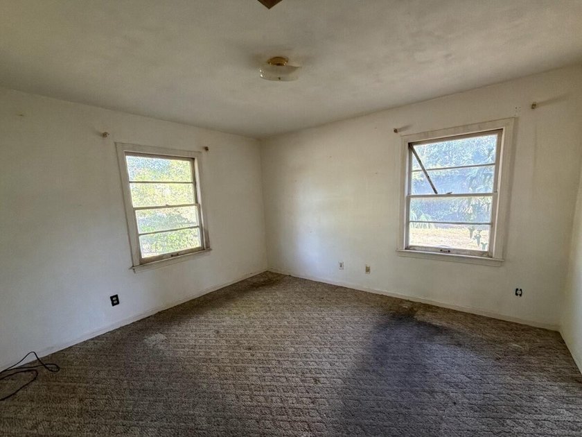 Located just a few miles from the bustling down town area and - photo 18