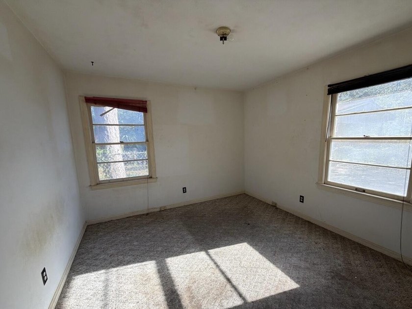 Located just a few miles from the bustling down town area and - photo 20