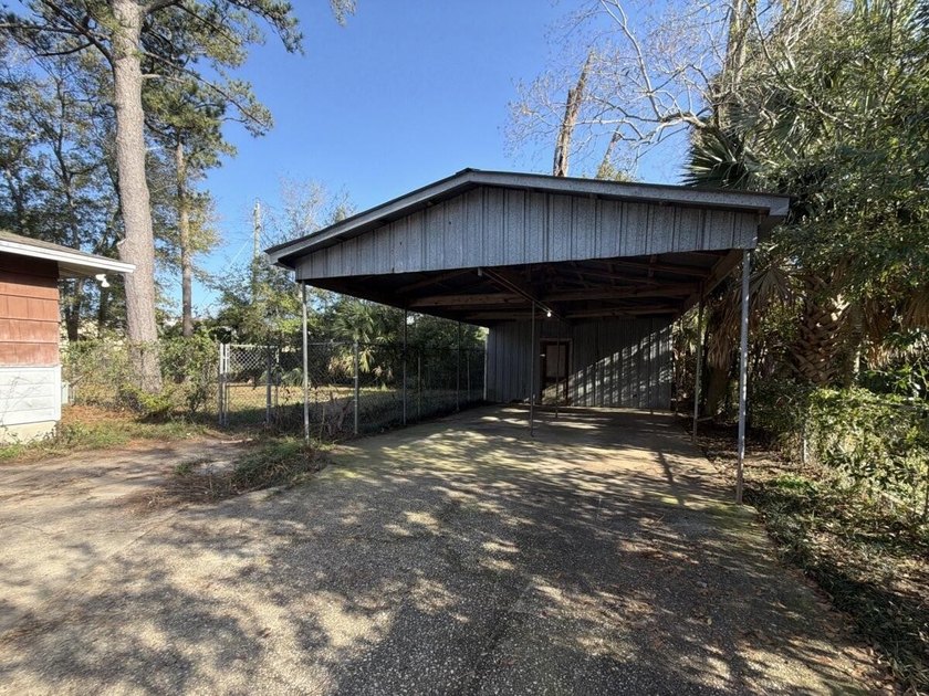 Located just a few miles from the bustling down town area and - photo 23