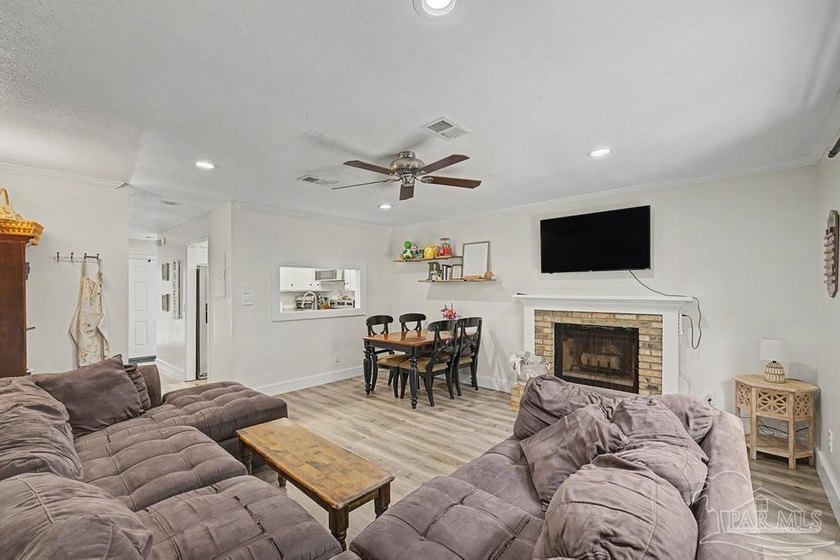Move-in ready end-unit townhome featuring 2 bedrooms, 1.5 - photo 3