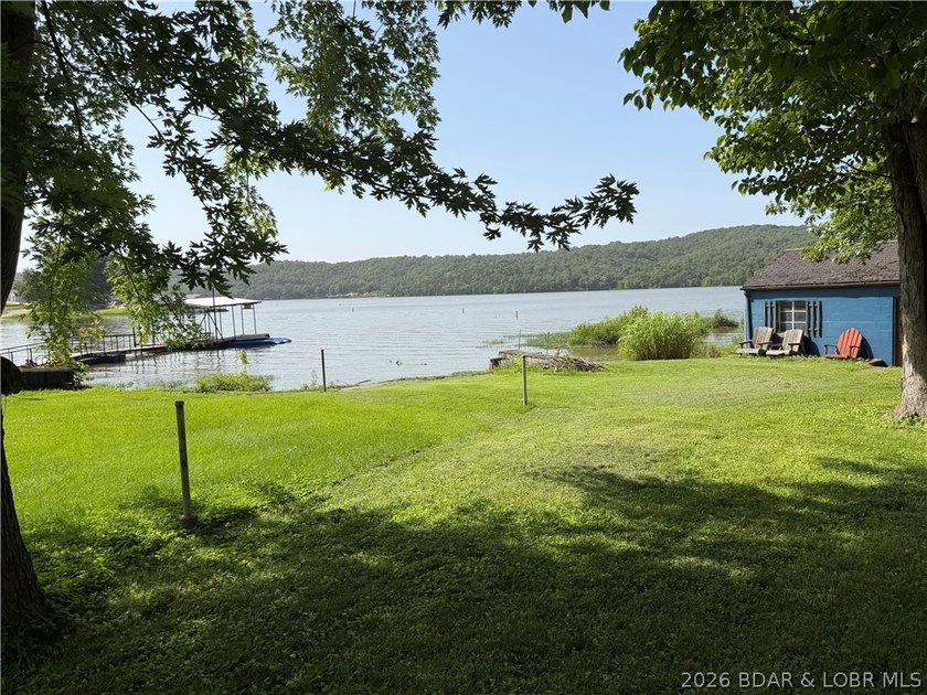 Rare 4-Lot Lakefront Property;Bonus Dock Lot Embrace this - photo 12