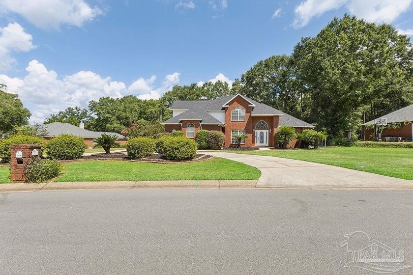Fully renovated and move-in ready! Nestled within a serene gated - photo 3