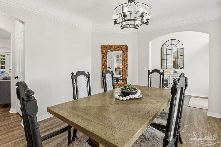 Fully renovated and move-in ready! Nestled within a serene gated - photo 7