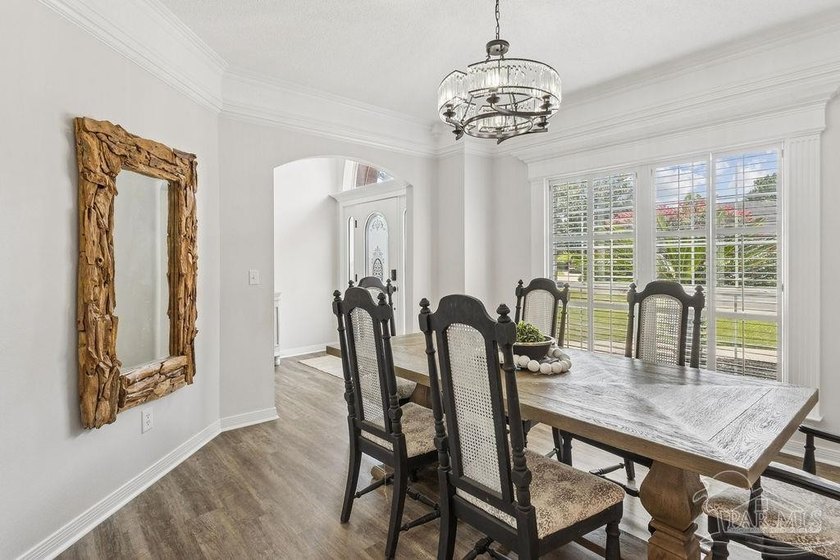 Fully renovated and move-in ready! Nestled within a serene gated - photo 8