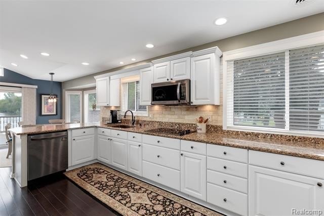 Situated in one of the most coveted waterfront settings on the - photo 12