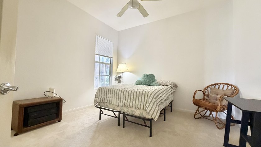 This well-designed home features 12-foot ceilings in the great - photo 12