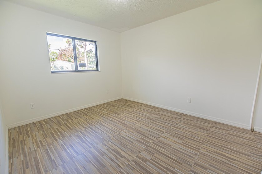 Opportunity awaits! This freshly painted 2-bedroom, 2-bath home - photo 14