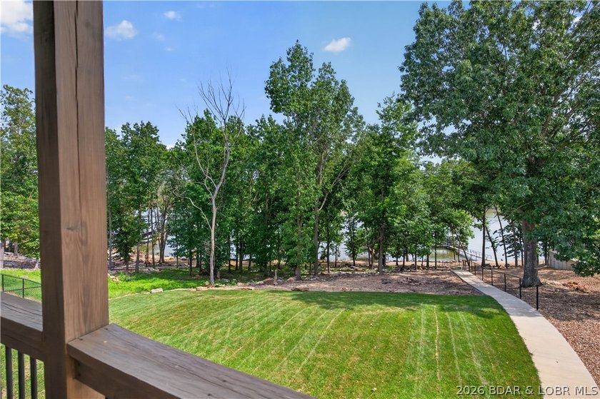 Enjoy waterfront living in this stunning 4-bedroom, 2.5-bath - photo 13