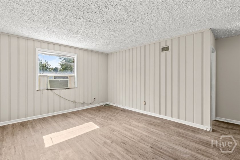 Solid and low-maintenance, this all-brick triplex sits in Garden - photo 31