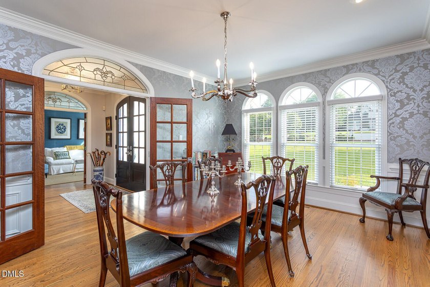 Classic elegance meets refined modern living in this exceptional - photo 12