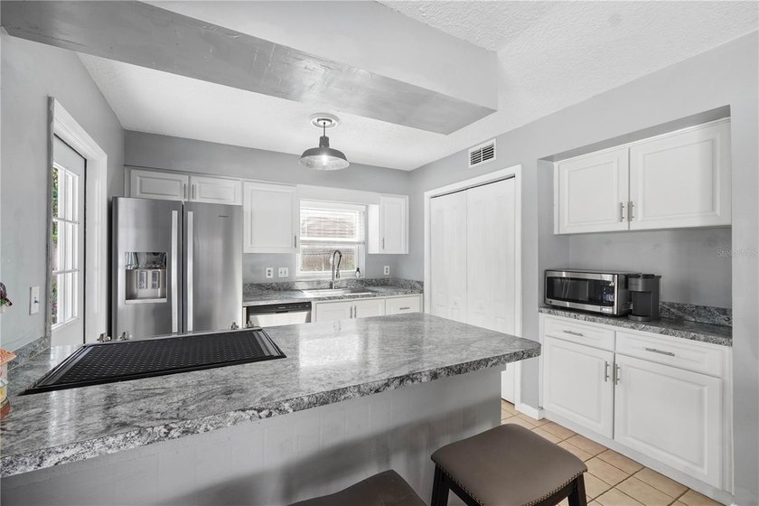 Welcome to 4712 Deerwalk Avenue, a warm and inviting - photo 17