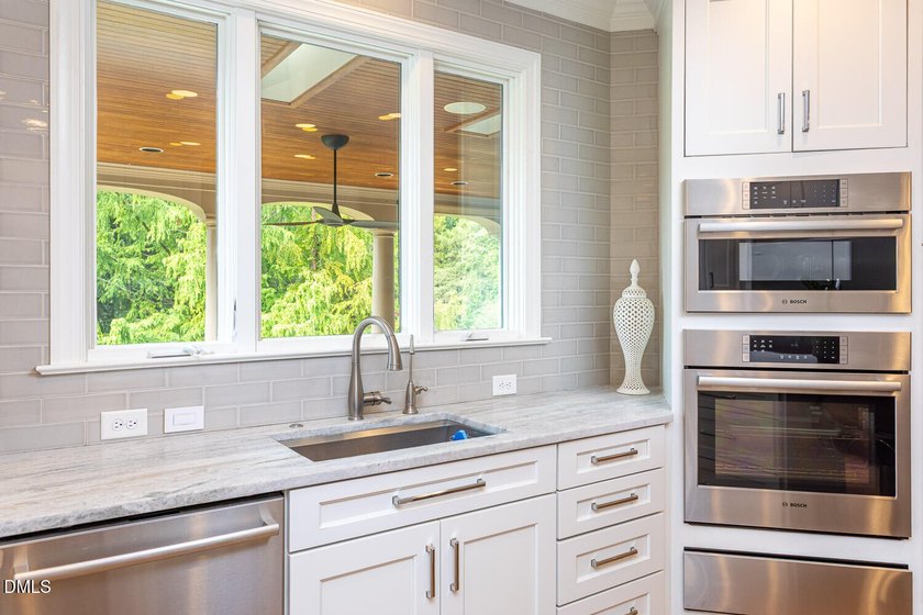 Classic elegance meets refined modern living in this exceptional - photo 22