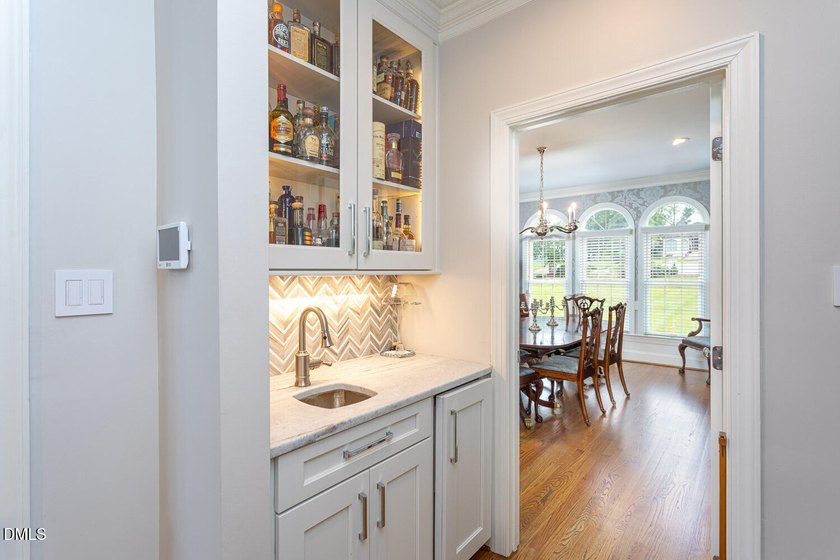 Classic elegance meets refined modern living in this exceptional - photo 29