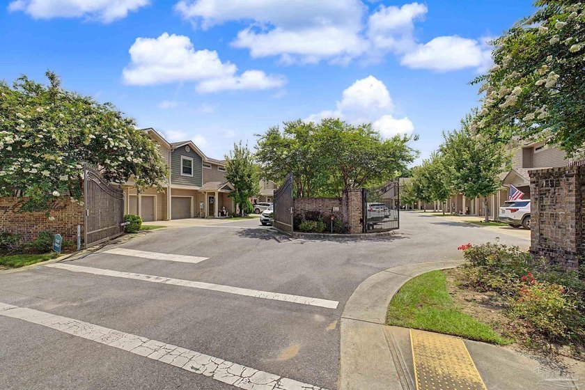 Luxury Living in a Gated Community! Step into this turn-key - photo 3