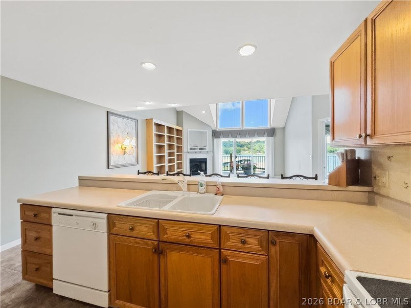 Welcome to this coveted top-level lakefront condo, offering over - photo 16