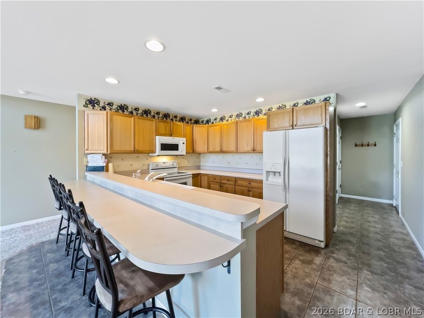 Welcome to this coveted top-level lakefront condo, offering over - photo 17