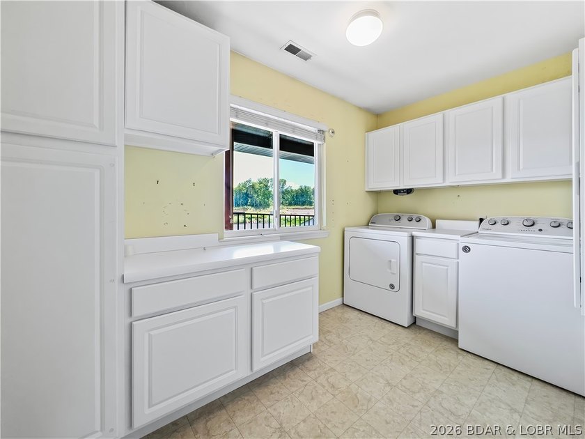 Welcome to this coveted top-level lakefront condo, offering over - photo 24