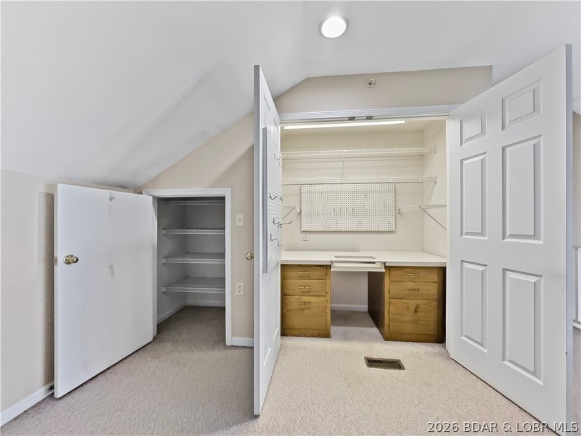Welcome to this coveted top-level lakefront condo, offering over - photo 32