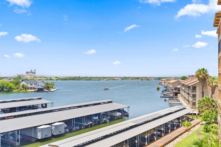 Set against the sparkling waters of Lake LBJ, this turn-key - photo 32