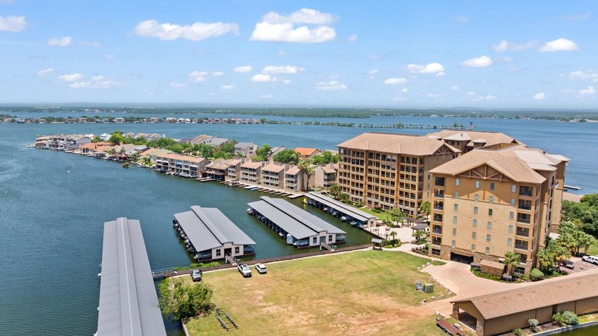 Set against the sparkling waters of Lake LBJ, this turn-key - photo 33