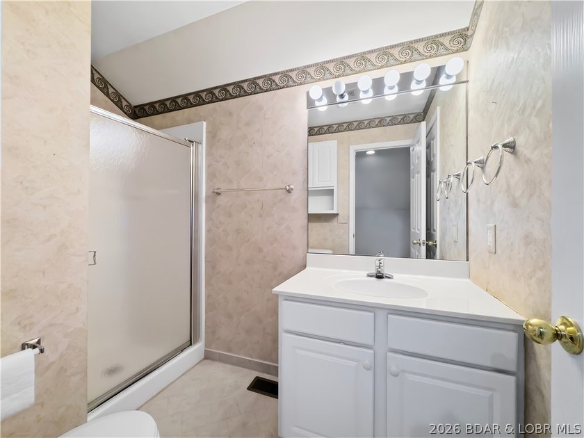 Welcome to this coveted top-level lakefront condo, offering over - photo 34
